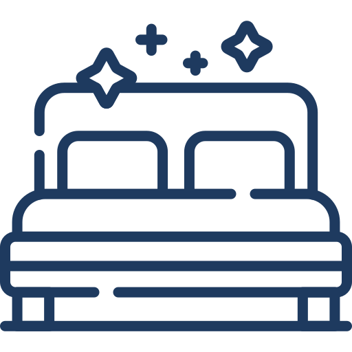 Icon of a neatly made bed with two pillows and sparkles above, suggesting cleanliness or comfort. The lines are simple and stylized.